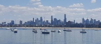 Melbourne City Skyline and boats in Swing Moorings